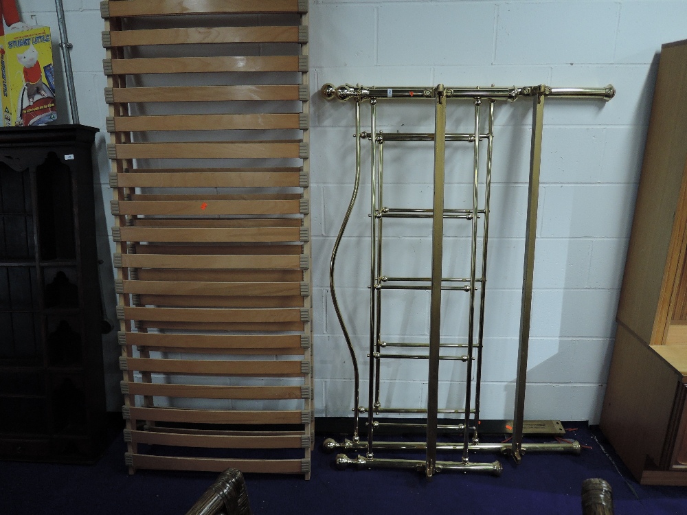 A modern brass bed frame , width approx 153cm (5 feet)