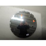 A vintage frameless circular wall mirror, diameter 40cm