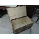 A vintage bedding box, having upholstered top