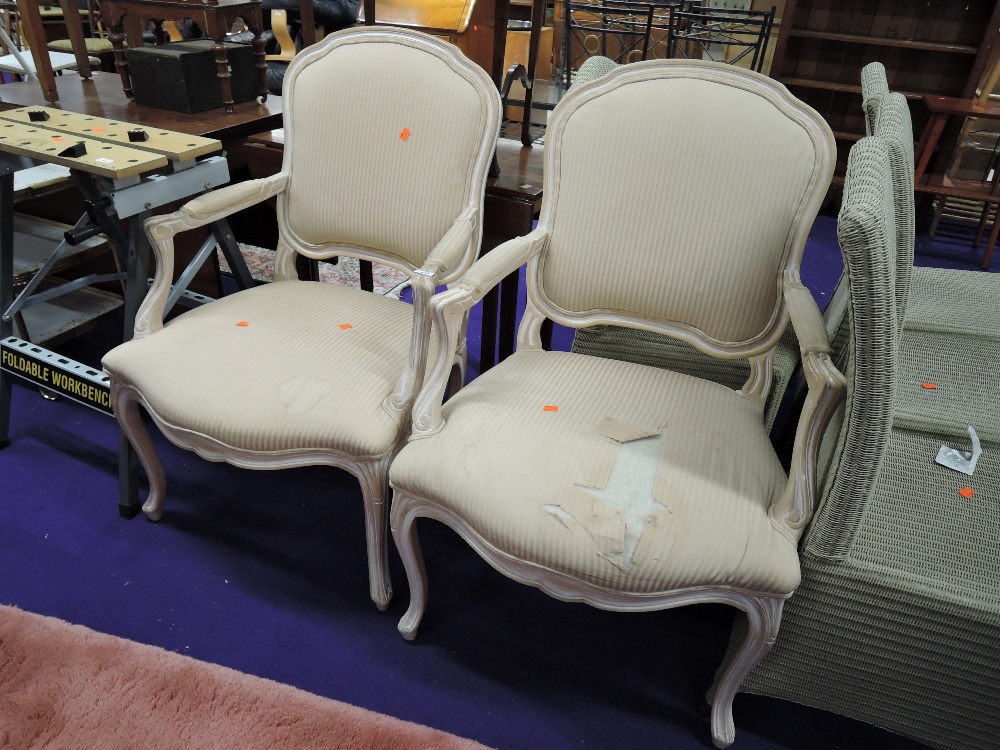 A pair of modern upholstered continental carver chairs