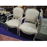 A pair of modern upholstered continental carver chairs