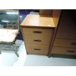 A vintage teak effect 3 drawer bedroom chest, similar to G plan, matches lots 696, 697 and 698