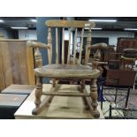 An traditional stripped child's rocking chair