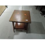 An Edwardian mahogany and inlaid occasional table