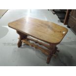 A solid oak table in a rustic design standing approx 50cm