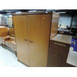 A vintage teak effect wardrobe, similar to G plan, matches lots 697, 698 and 699