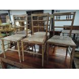 A selection of five Victorian cane seated bedroom chairs, all similar designs , with bobbin backs