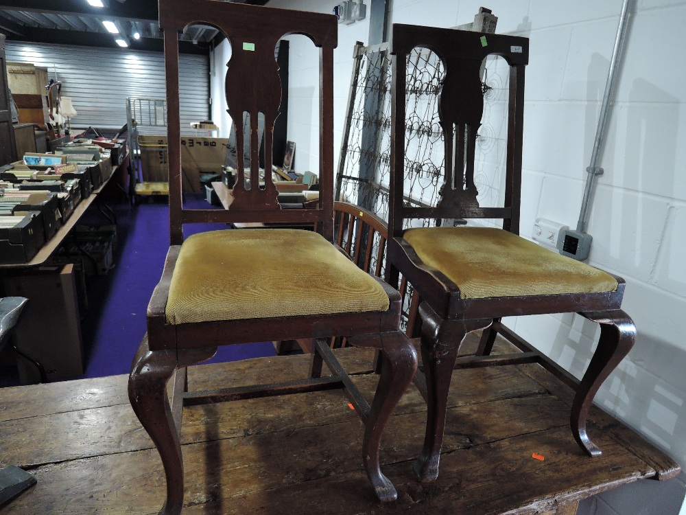 Two early 20th dining chairs having upholstered seats