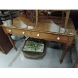 A traditional pine side table having ledge back, turned legs and ceramic drawer handles to the two