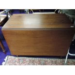 An early 20th century drop leaf mahogany dining table