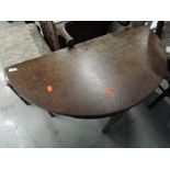 A 19th Century mahogany 'D' half moon table