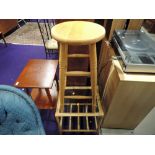 A modern pine stool and a wicker occasional table