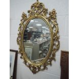 A modern Chippendale styled mirror