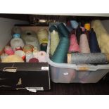 A good selection of wool and yarn cones for weaving and similar crafts over two boxes