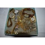 A selection of lady's costume watches and gold plated chains
