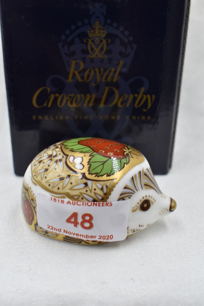 A Royal Crown Derby Collectors Guild Strawberry Hedgehog paperweight, boxed with gold stopper