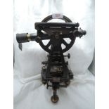 A vintage surveyors theodolite having brass fitments uncased