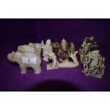 A selection of cast and carved Chinese and similar oriental figures including Elephant, Nude lady