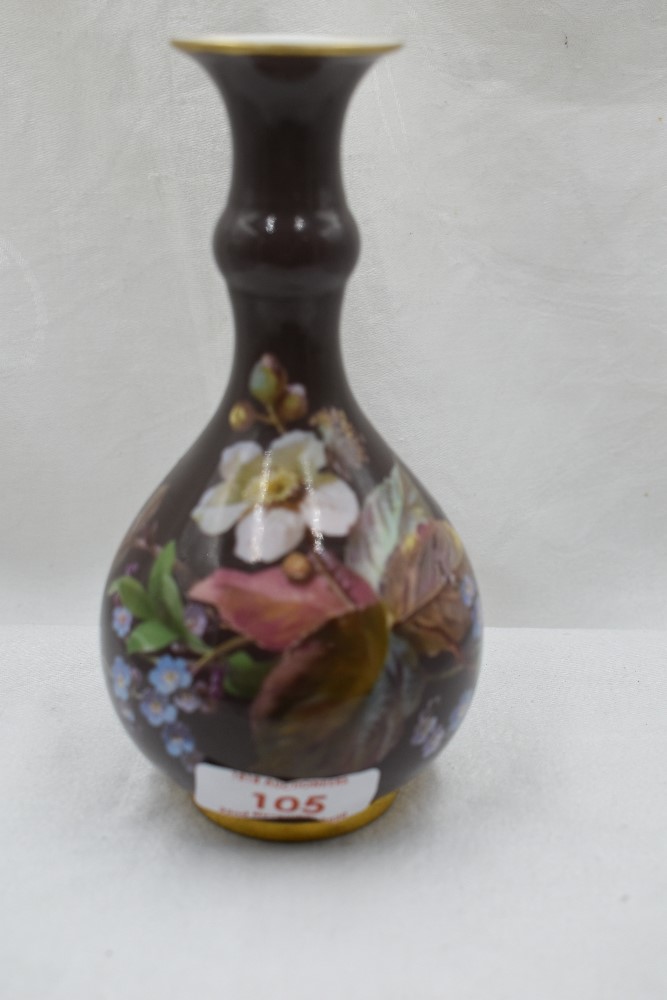 A squat vase by Meissen bearing double sword to base having naturalistic ground with floral imagery