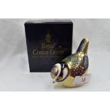 A Royal Crown Derby Blue Tit paperweight, boxed with gold stopper