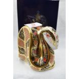 A Royal Crown Derby Snake paperweight, boxed with gold stopper