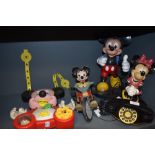 A selection of Mickey and Minnie mouse collectables by Walt Diney including Super Fone