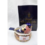 A Royal Crown Derby Bullfinch nesting paperweight, boxed with gold stopper