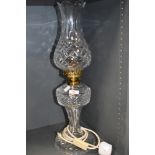 A Waterford crystal table lamp in the form of an oil lamp.