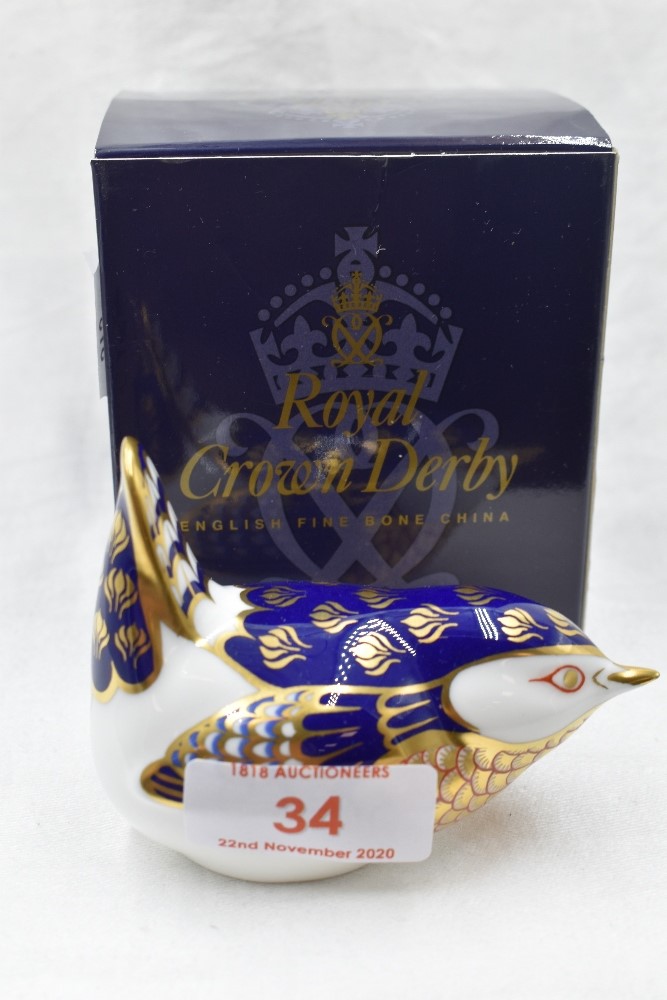 A Royal Crown Derby Wren paperweight, boxed with gold stopper