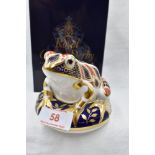 A Royal Crown Derby Frog paperweight, boxed with gold stopper