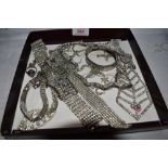 A small selection of diamante costume jwellery including tie shaped necklace, bracelets etc