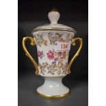 A lidded Porzellanfabrik Martinroda Dresden china lidded urn with floral pattern with hand tinted