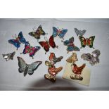 A small selection of bird and butterfly brooches