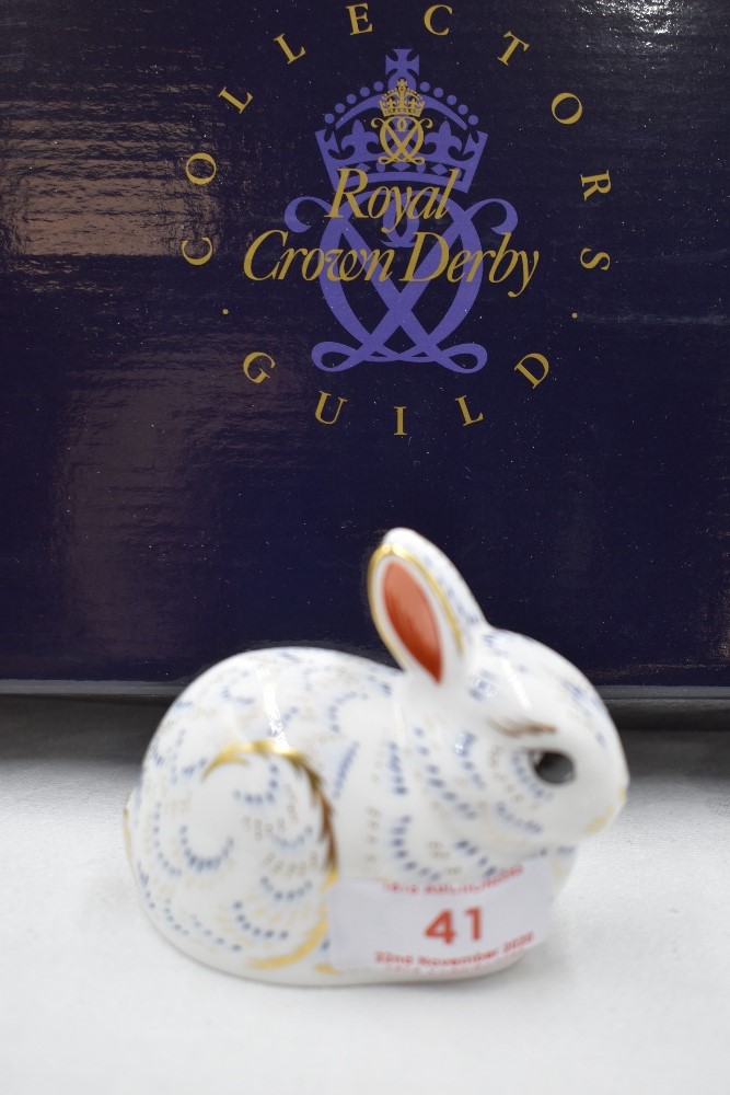 A Royal Crown Derby Collectors Guild Bunny paperweight, boxed with gold stopper