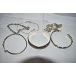 Six white metal bracelets and bangles, all stamped 925 and of various designs