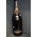 A very large bottle advertising Champagne Pommery dated 1959 larger than a magnum possibly a