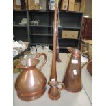 A selection of copper wares including half gallon and post horn