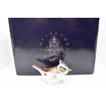 A Royal Crown Derby Collectors Guild Crested Tit paperweight, boxed with gold stopper
