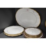 A selection of dinner wares including Copelands blue and gilt scalloped plates and similar Cauldon