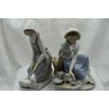 Two ceramic figure studies by Nao of girl with lamb and girl with kitten