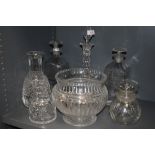 A collection of glass including cut glass decanters.