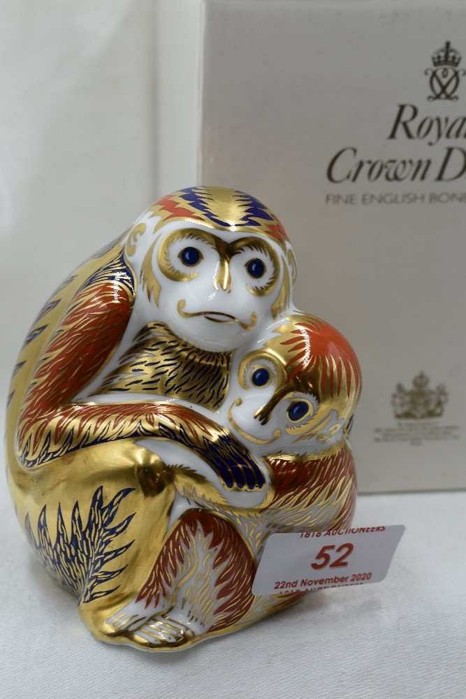 A Royal Crown Derby Monkey and Baby paperweight, boxed with gold stopper