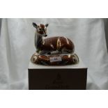 A Royal Crown Derby Collectors Guild Deer paperweight, boxed with gold stopper