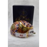 A Royal Crown Derby Collectors Guild Orchard Hedgehog paperweight, boxed with gold stopper