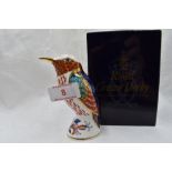 A Royal Crown Derby Hummingbird paperweight, boxed with gold stopper