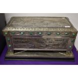 A 1930s table top casket having individual pewter panels, and green hard stone decorative detailing