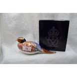 A Royal Crown Derby Pheasant paperweight, boxed with gold stopper
