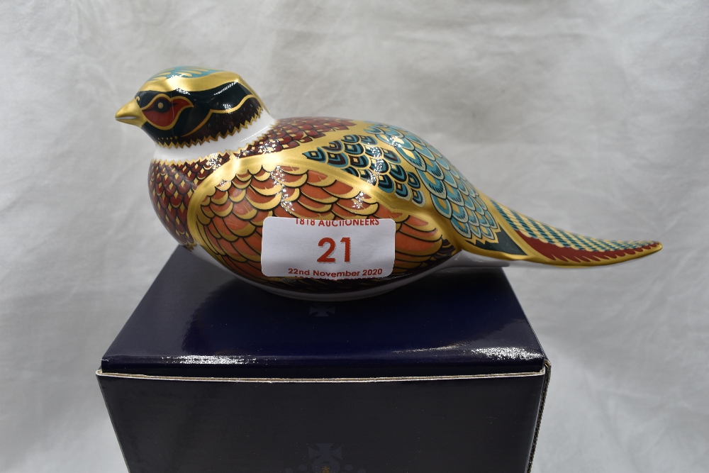 A Royal Crown Derby Collectors Guild Woodland Pheasant paperweight, boxed with gold stopper