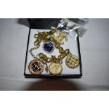 A Swarovski rainbow crystal heart necklace, a costume jewellery gold plated bracelet having Chanel