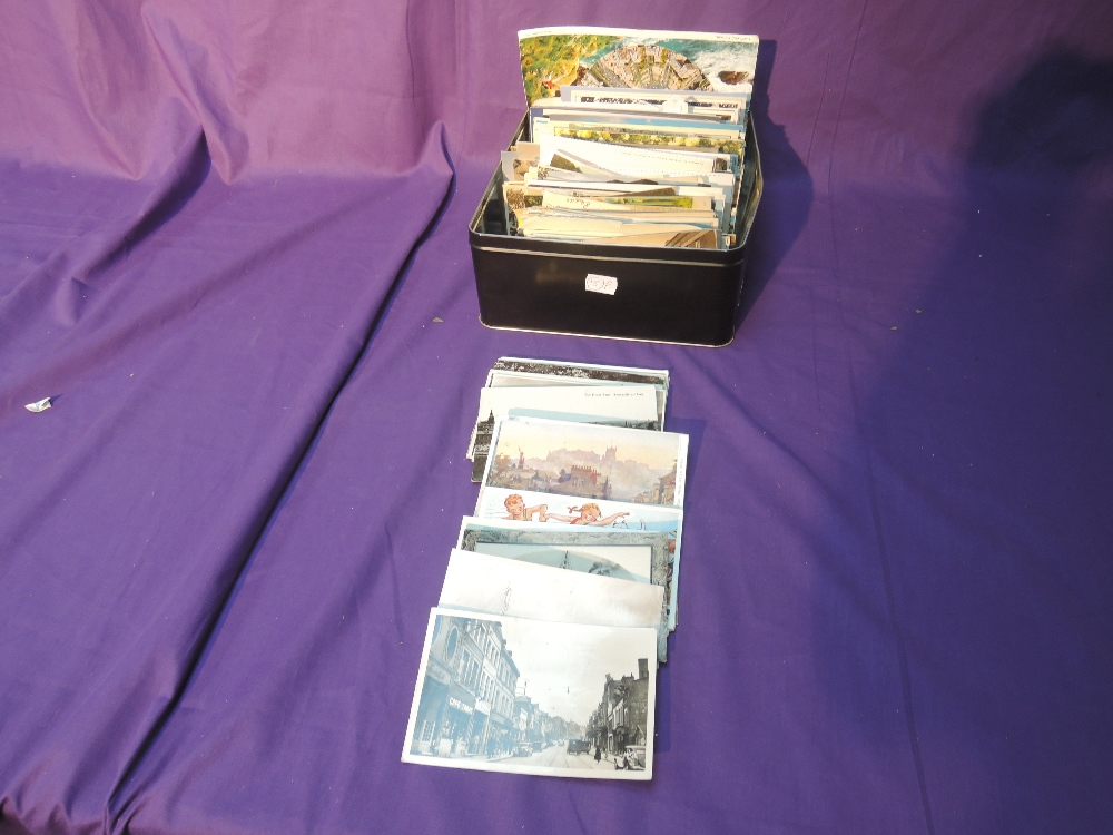 A box of vintage and modern Postcards
